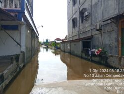 Turun Hujan Badan Jalan Tergenang Air